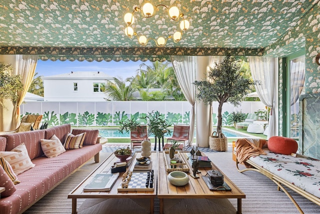 interior space with plenty of natural light and a chandelier