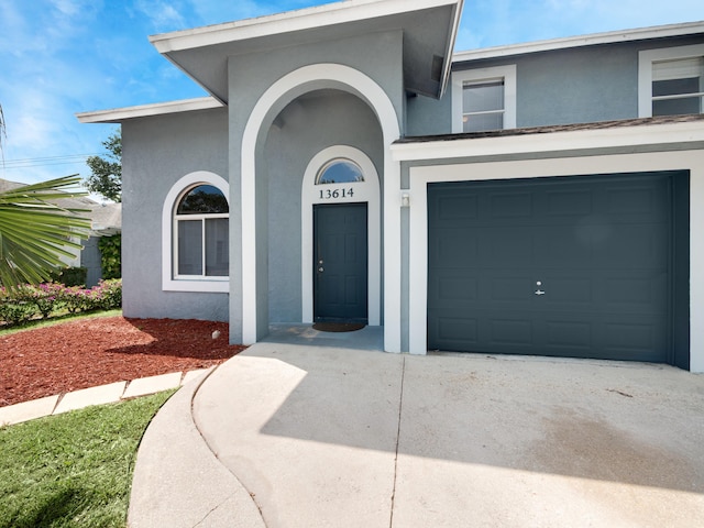 entrance to property with a garage