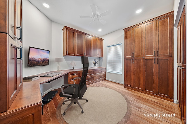 office area featuring ceiling fan, built in desk, light wood-style flooring, and recessed lighting