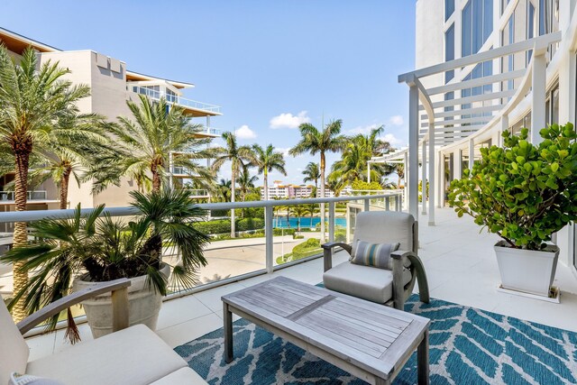 view of patio / terrace with a balcony