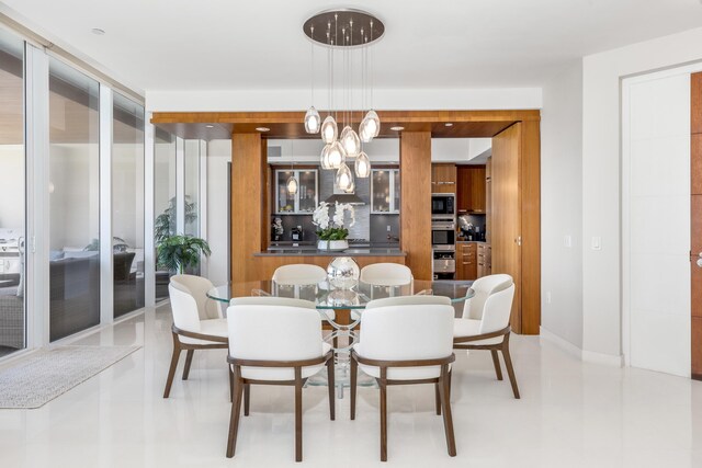 dining room featuring a wall of windows