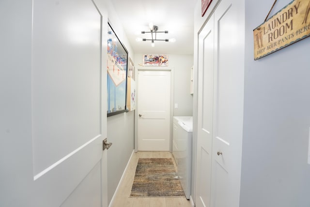 interior space featuring light hardwood / wood-style floors and independent washer and dryer