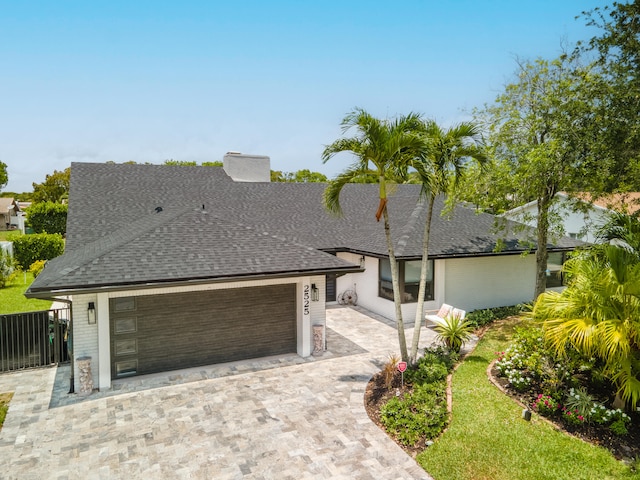 view of front of property with a garage