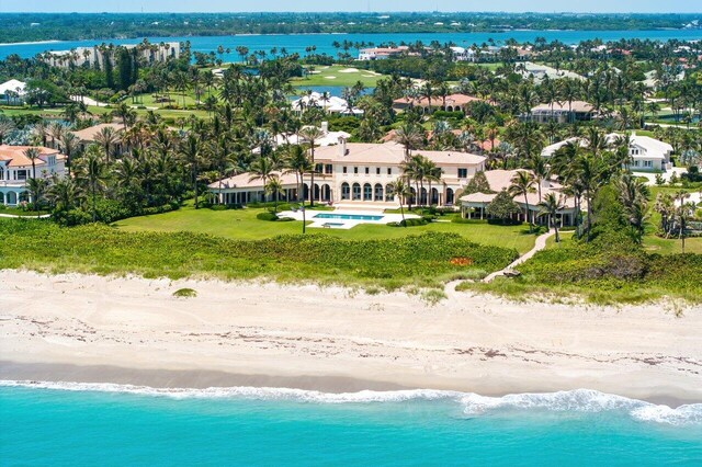 bird's eye view featuring a view of the beach and a water view