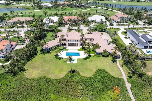 bird's eye view with a residential view, a water view, and golf course view