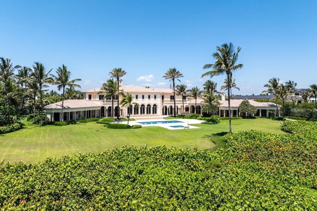 view of yard featuring an outdoor pool