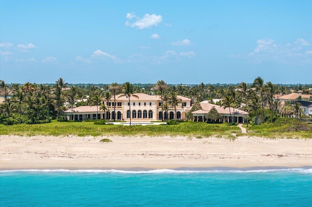 aerial view with a water view and a view of the beach