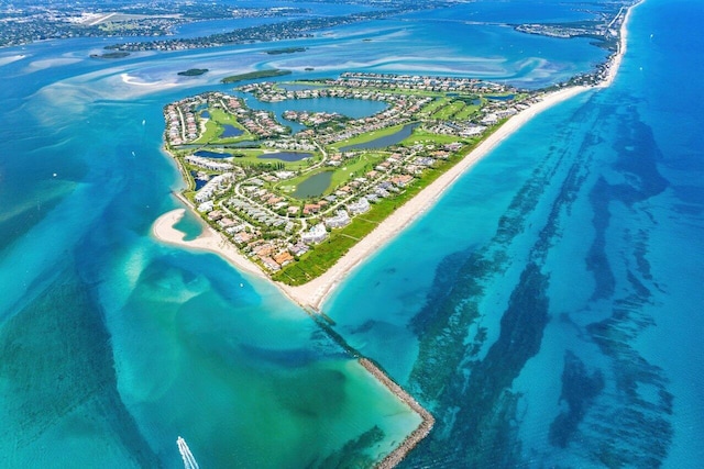 bird's eye view featuring a beach view and a water view