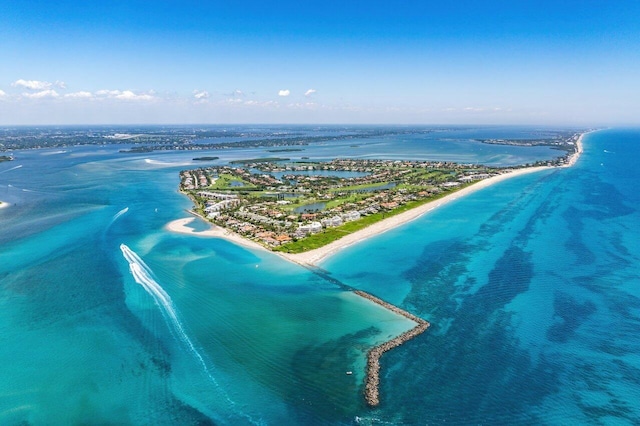 aerial view featuring a water view and a view of the beach