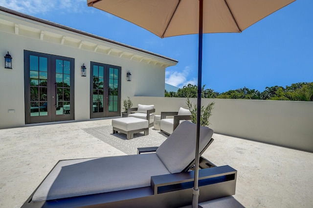 view of patio with outdoor lounge area and french doors