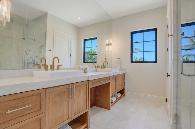 bathroom featuring walk in shower, tile flooring, dual sinks, and large vanity