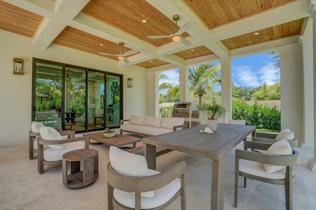 view of terrace with an outdoor hangout area and ceiling fan