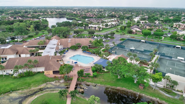 drone / aerial view with a water view