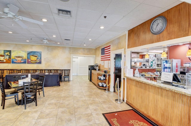 interior space featuring ceiling fan