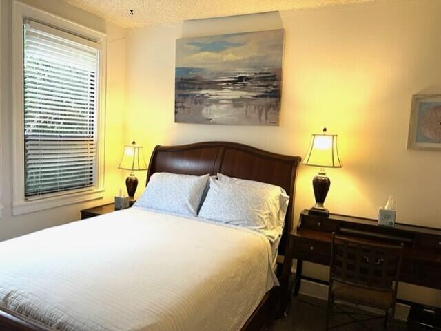 bedroom featuring a textured ceiling