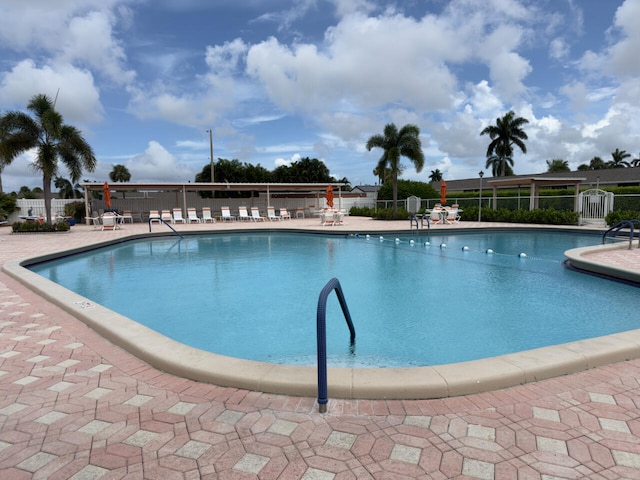 view of swimming pool featuring a patio