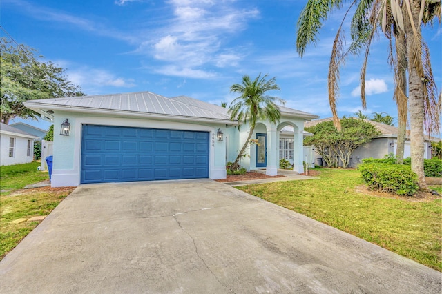 single story home with a front lawn and a garage