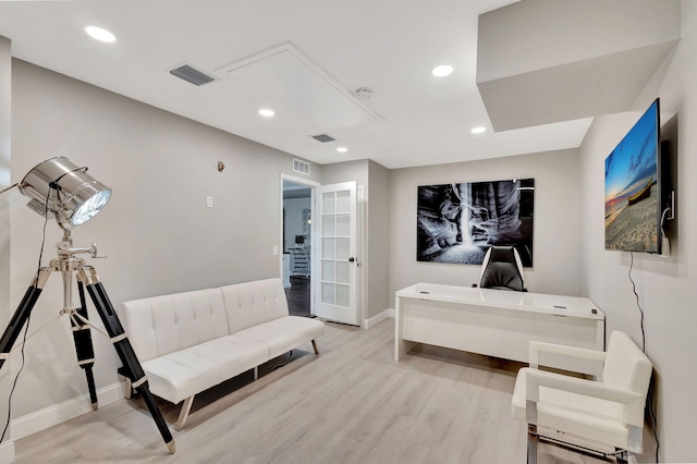 living area with light hardwood / wood-style floors