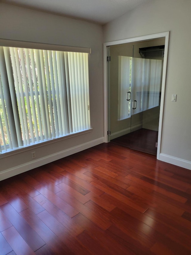 spare room featuring hardwood / wood-style flooring