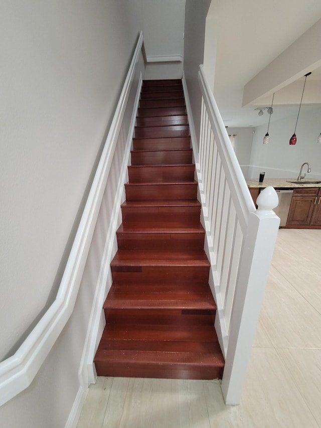 staircase with sink