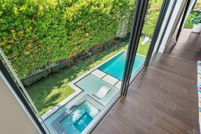 view of pool featuring a yard