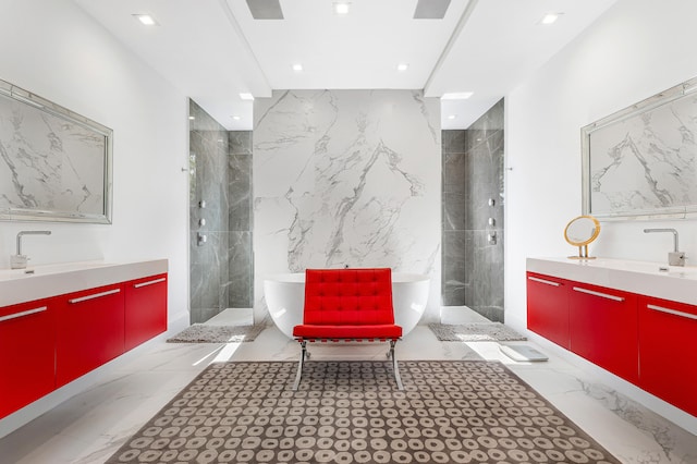 bathroom with tile flooring, vanity, and plus walk in shower