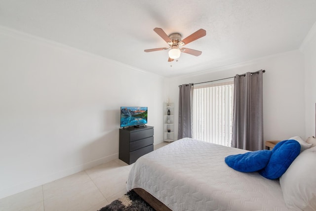 tiled bedroom featuring a textured ceiling, ornamental molding, and ceiling fan