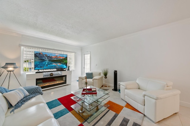 tiled living room with a textured ceiling, ornamental molding, and plenty of natural light