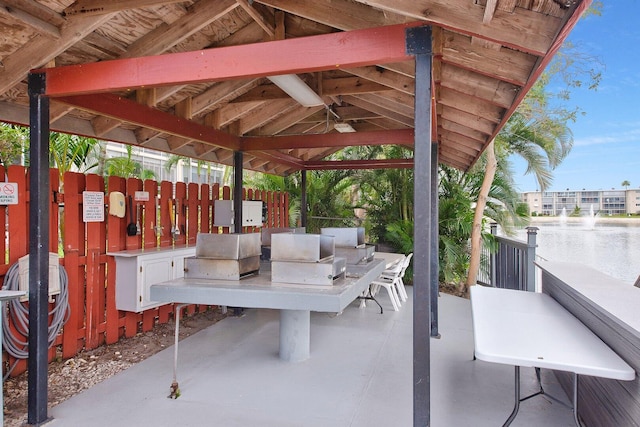 view of patio featuring ceiling fan and a gazebo