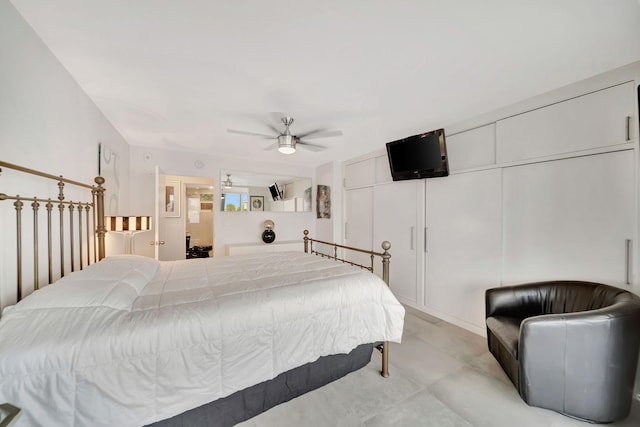 bedroom with ceiling fan and a closet