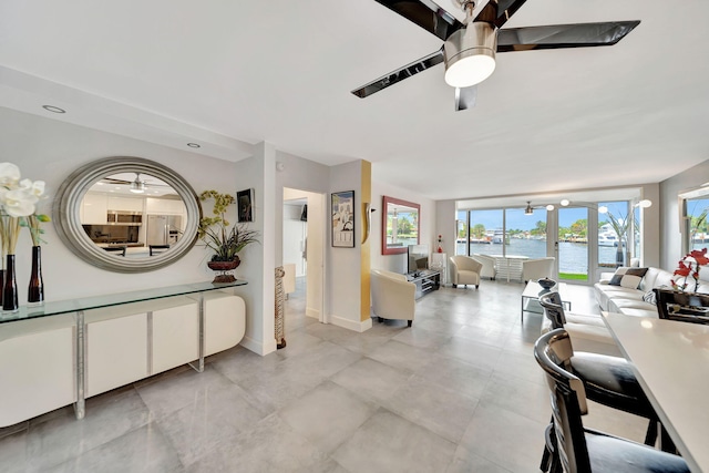 interior space featuring ceiling fan