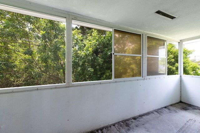 unfurnished sunroom with a healthy amount of sunlight