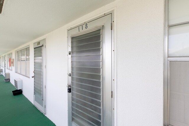118 Kingswood F Unit 118, West Palm Beach, FL 33417 - view of doorway to property