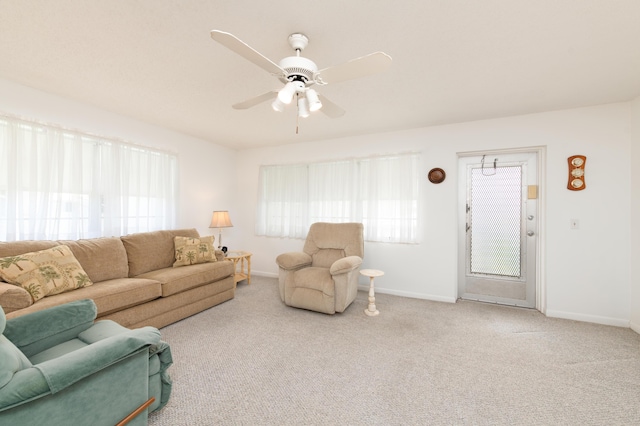 118 Kingswood F Unit 118, West Palm Beach, FL 33417 - living room with plenty of natural light, a ceiling fan, carpet floors, and baseboards