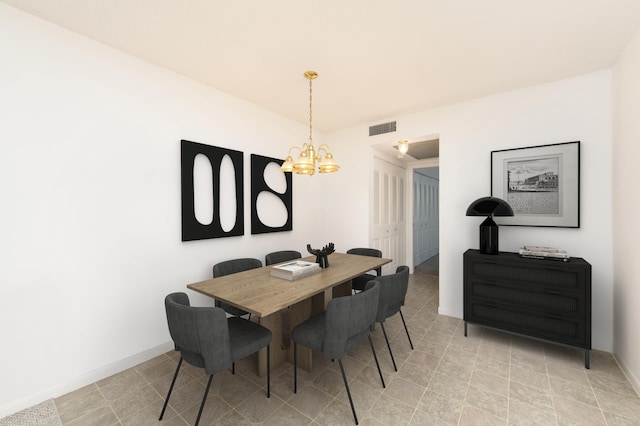 118 Kingswood F Unit 118, West Palm Beach, FL 33417 - dining space featuring a chandelier and baseboards