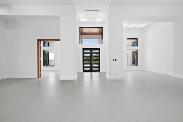 entrance foyer featuring a high ceiling