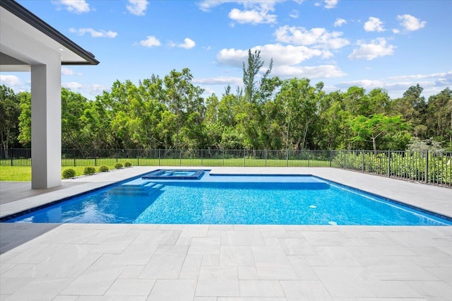 view of pool featuring an in ground hot tub and a patio