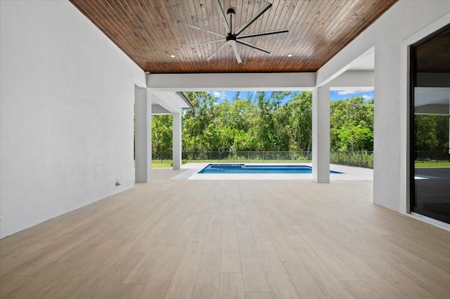 view of pool with ceiling fan