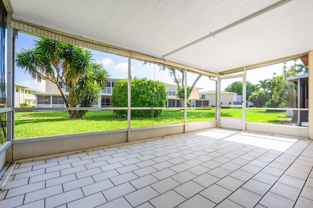 unfurnished sunroom with a healthy amount of sunlight