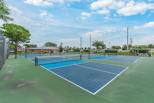 view of sport court with basketball hoop