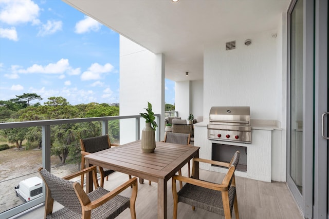 balcony featuring a grill