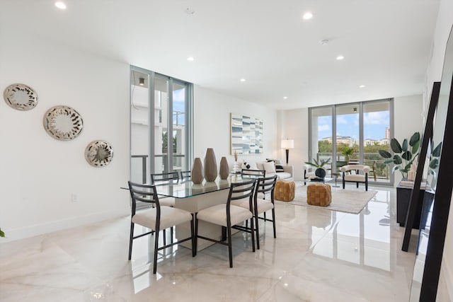 dining area featuring expansive windows