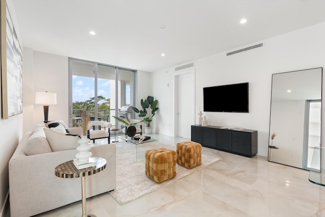 living room with a wall of windows