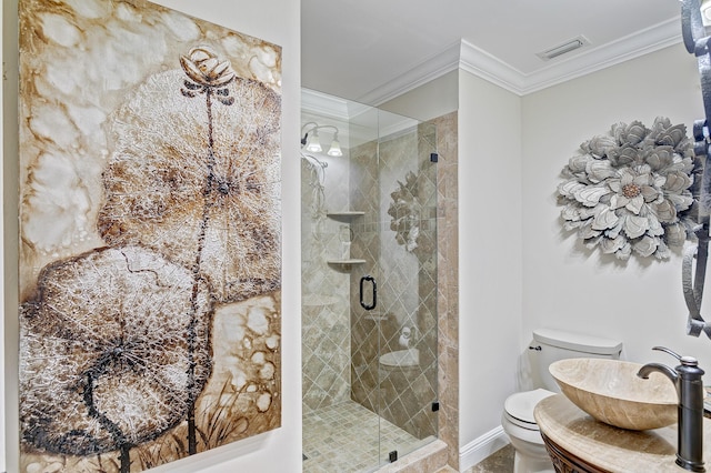 bathroom featuring toilet, crown molding, sink, and walk in shower