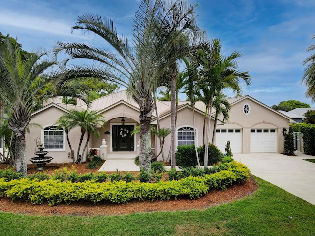 ranch-style home featuring a garage