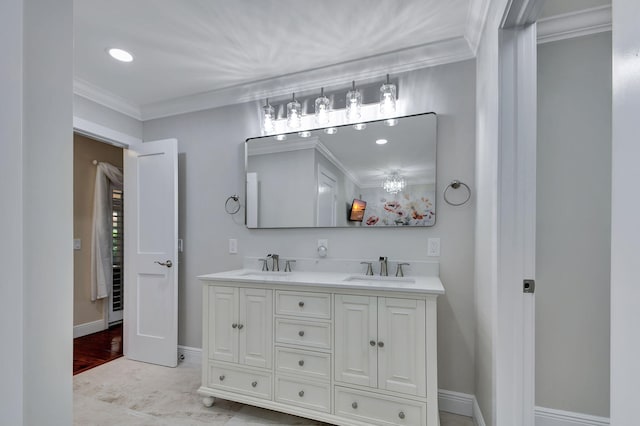 bathroom featuring vanity and ornamental molding