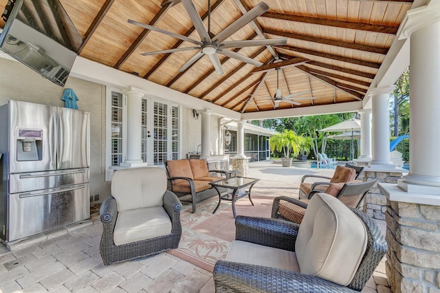 view of patio with a gazebo and ceiling fan