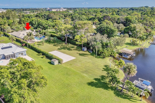 birds eye view of property with a water view