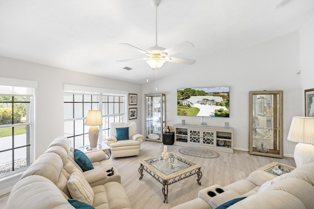 living room featuring light wood-type flooring, ceiling fan, and lofted ceiling