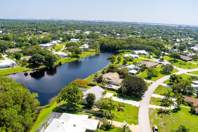 birds eye view of property featuring a water view